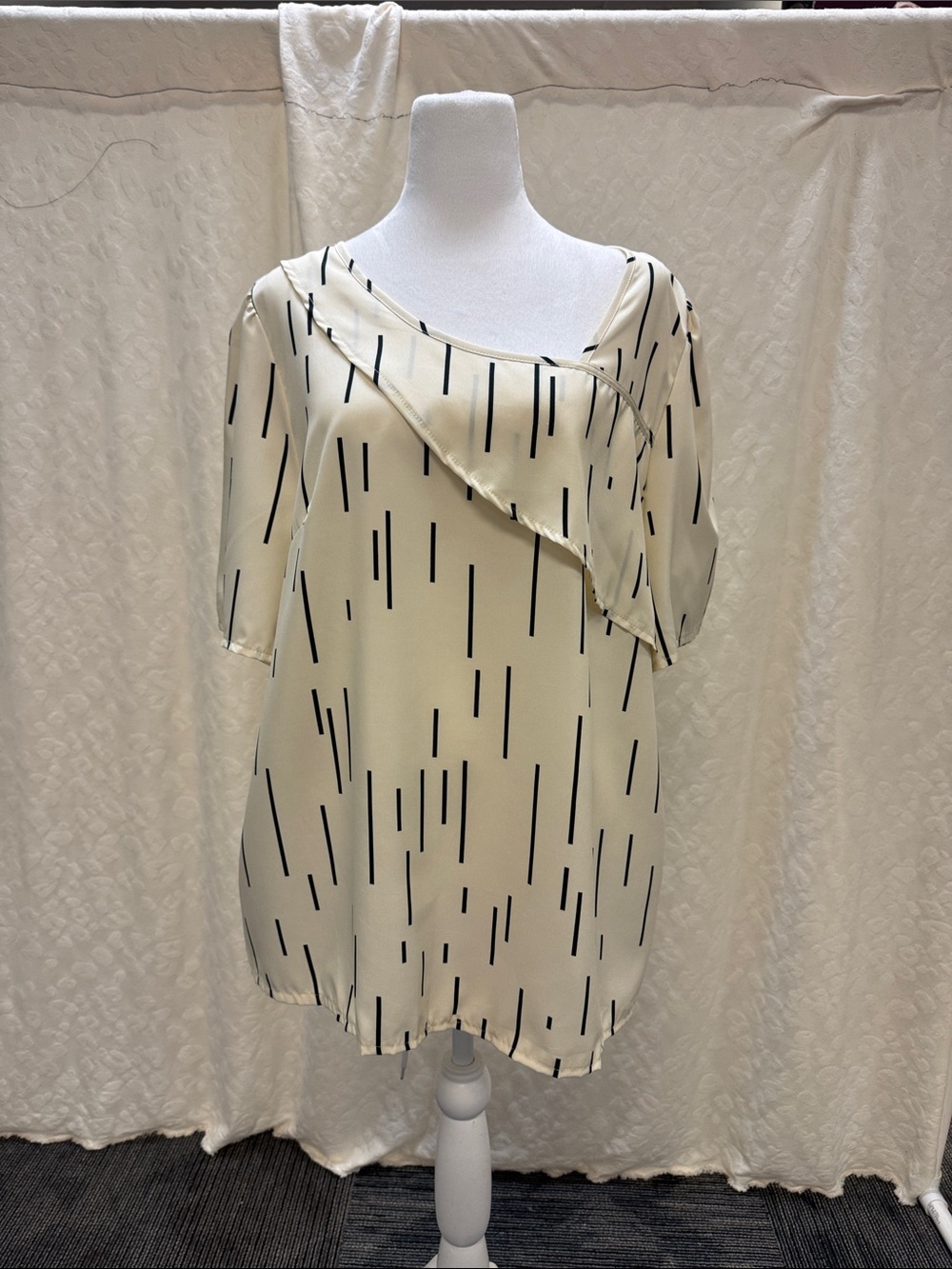 Ivory and Black Geometric Print Ruffle Neck Blouse